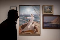 Silhouette d'homme devant un tableau de femme à la barre 