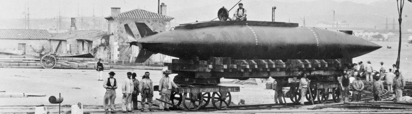 Sea trials of the submarine Gymnote, 1888, prototype on quay with crew and crane in background, black-and-white photograph.